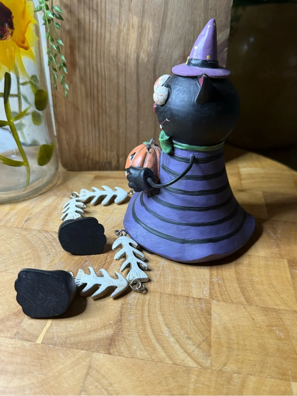 Whimsical Halloween Witch Cat Figurine with Dangling Skeleton Legs & Pumpkin